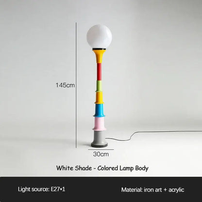 A vibrant 145cm tall decorbites colorful memphis floor lamp with a white spherical shade and acrylic colorful memphis floor segments