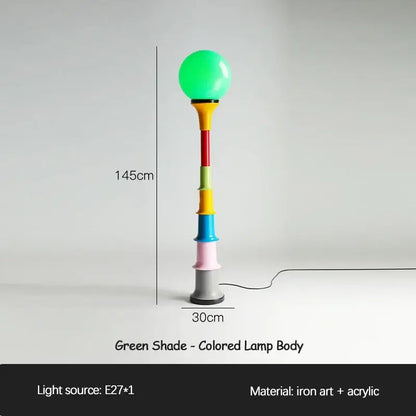 A 145cm decorbites colorful memphis floor lamp with a glowing green shade and segmented acrylic iron art body for bedroom