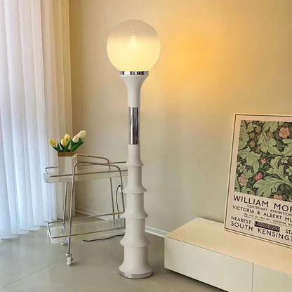 White floor lamp with frosted glass globe and chrome accents in decorbites colorful memphis floor lamp design