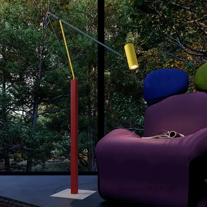 A decorbites colorful metal led adjustable floor lamp in vibrant yellow with red base for modern living room lighting