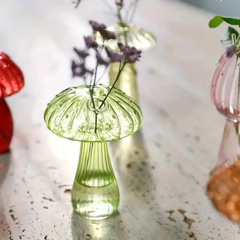 DecorBites™ colorful mushroom vase in translucent green glass with ribbed stem and purple flowers for home decor