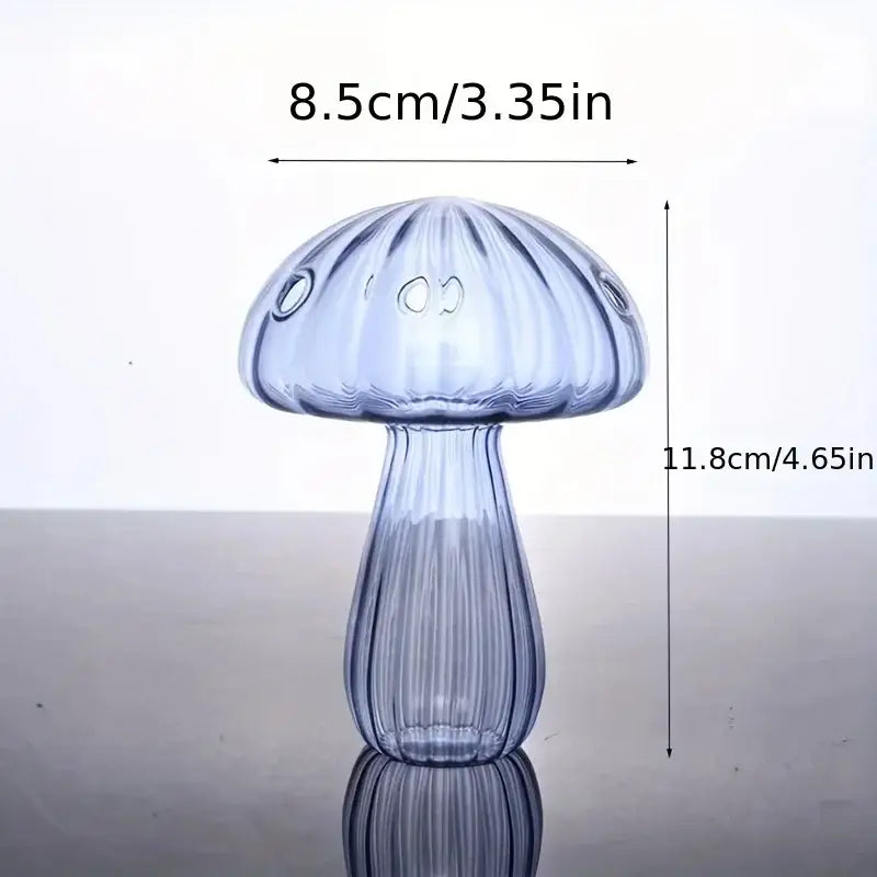 DecorBites™ colorful mushroom vase made of translucent blue glass with vertical ridges and three circular cutouts