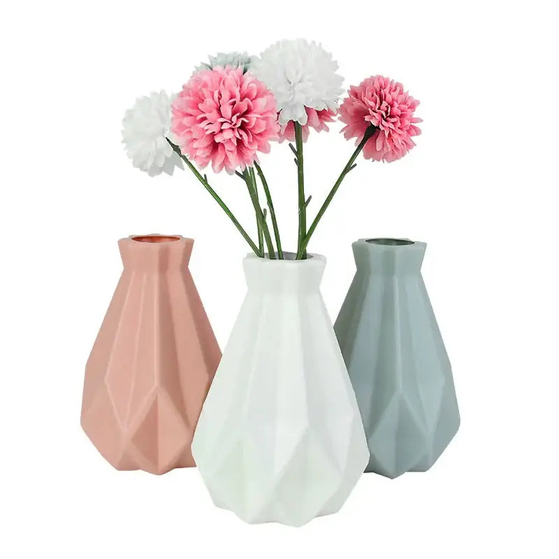 DecorBites™ colorful plastic flower vases in soft pink white and muted teal with geometric faceted design for home décor