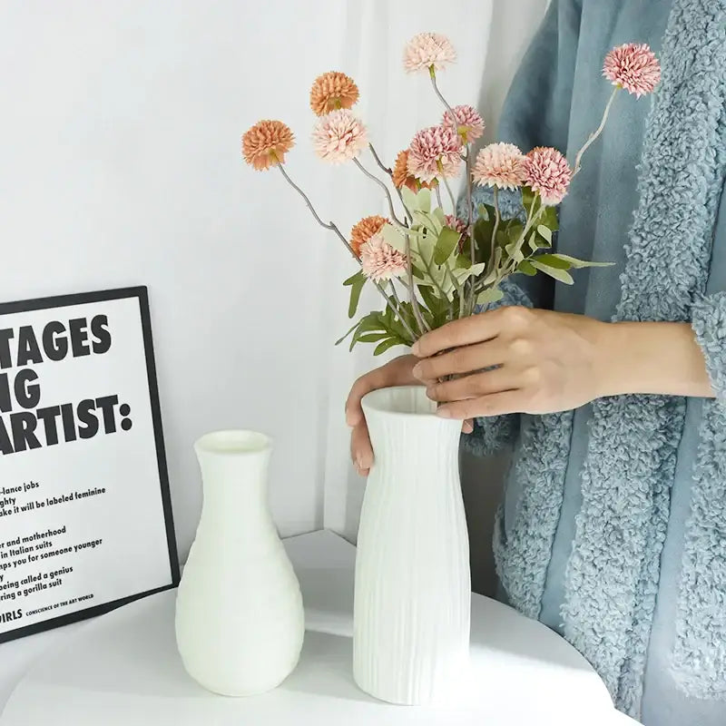 White ceramic modern flower vase with vertical ridged texture from DecorBites colorful plastic flower vase collection