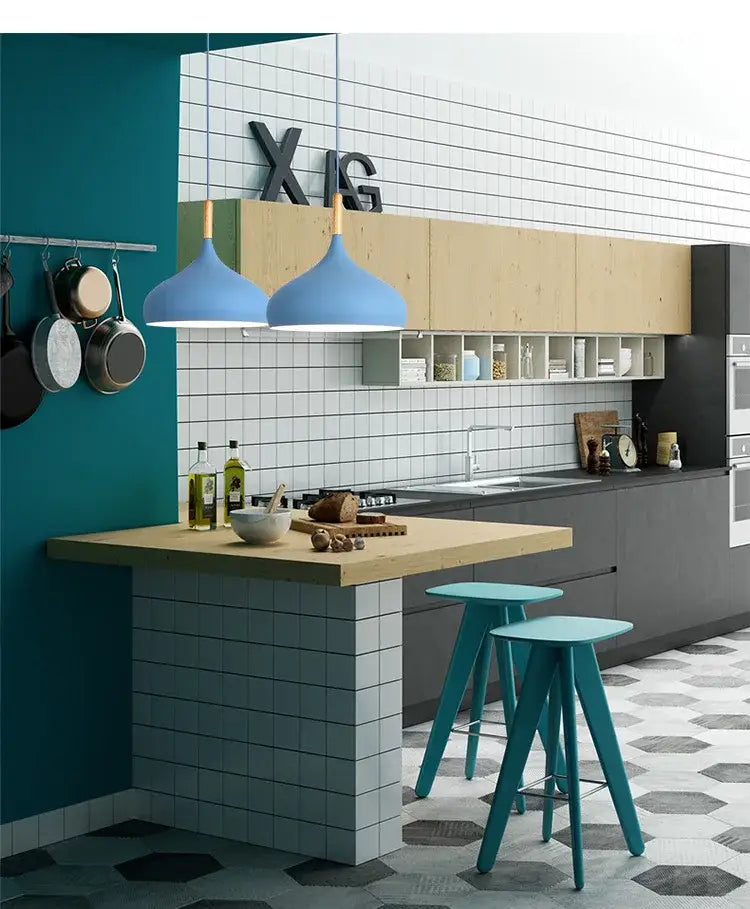 Blue pendant lights with wooden fixtures hanging above kitchen island colorful retro pendant lights by decorbites