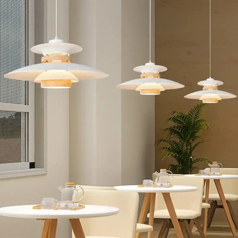 White layered pendant lights with wooden accents and warm glow in decorbites colorful umbrella led chandeliers cream amber