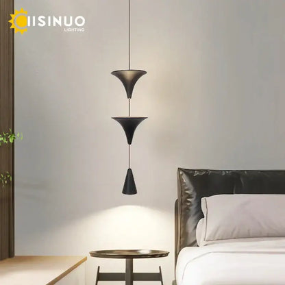Black decorbites cone pendant light with three stacked conical shades ideal for kitchen island or bedside lighting