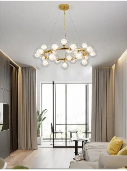DecorBites™ contemporary black and gold chandelier with white glass balls arranged in a circular pattern