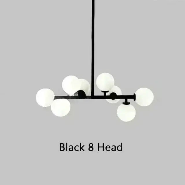 DecorBites™ contemporary black metal chandelier with eight frosted white glass ball globe lights in gold accents