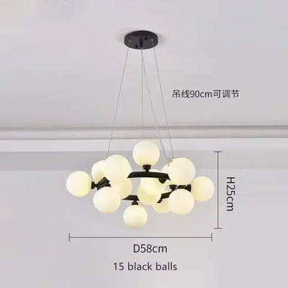 Modern black metal chandelier by DecorBites with 15 frosted white glass ball globes in a contemporary design