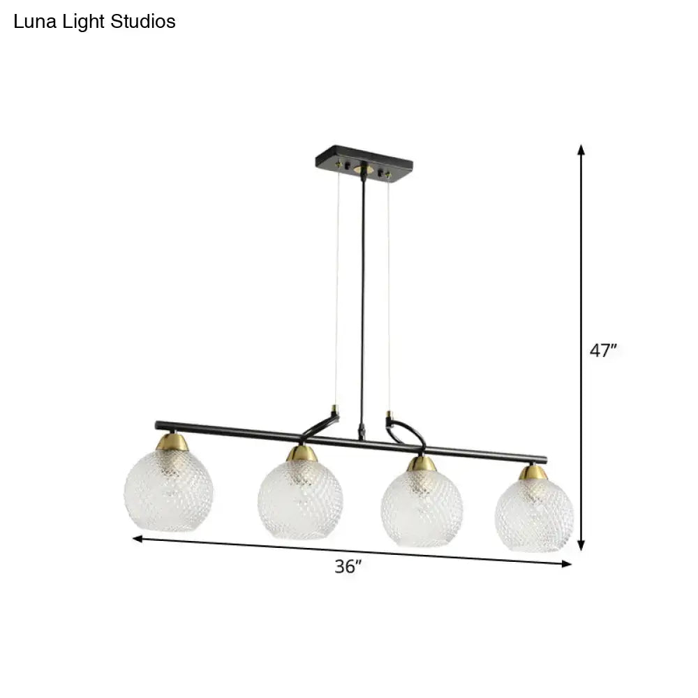 DecorBites™ contemporary black metal bar pendant light with four clear prismatic glass globe shades and brass accents for dining hall