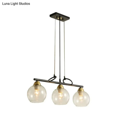 DecorBites contemporary black metal chandelier with clear prismatic glass globes and brass accents for dining hall lighting