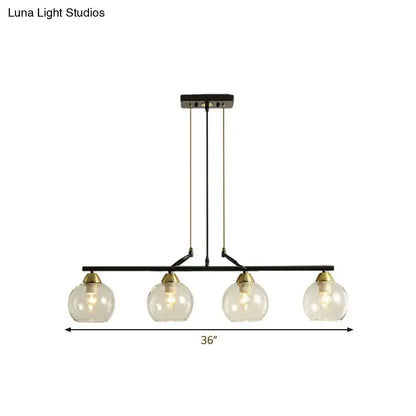 Decorbites contemporary black metal bar pendant light with clear prismatic glass globes and brass accents for dining hall