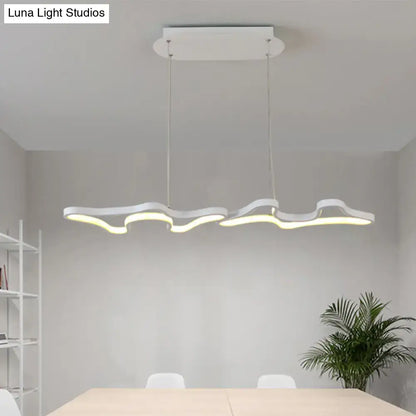 DecorBites modern black white metal island light with wave design pendant and warm glow for contemporary spaces