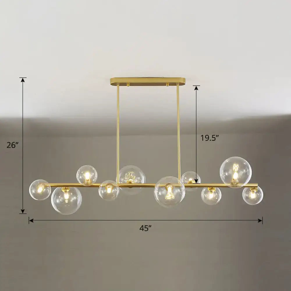 Gold-toned DecorBites™ contemporary ceiling light with clear glass globe bulbs for dining room island lighting