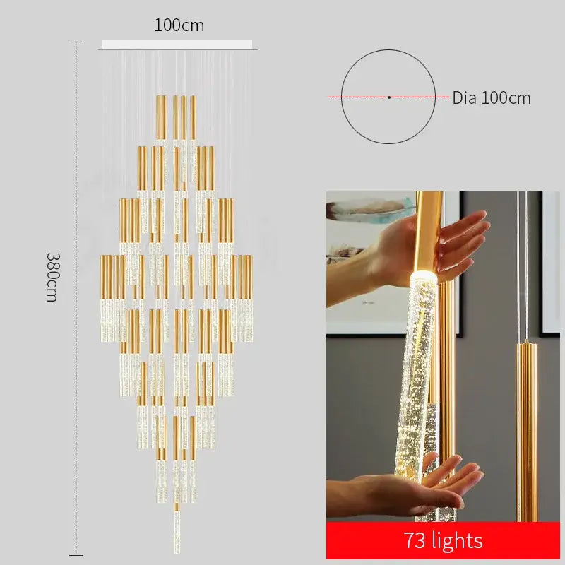 DecorBites™ contemporary crystal chandelier with gold metal frame and cascading crystal cylinders for large staircase