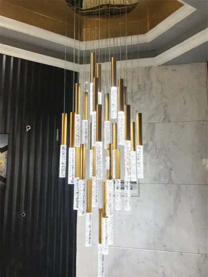 DecorBites™ contemporary crystal chandelier with gold metal rods and clear crystal cylinders for large staircase