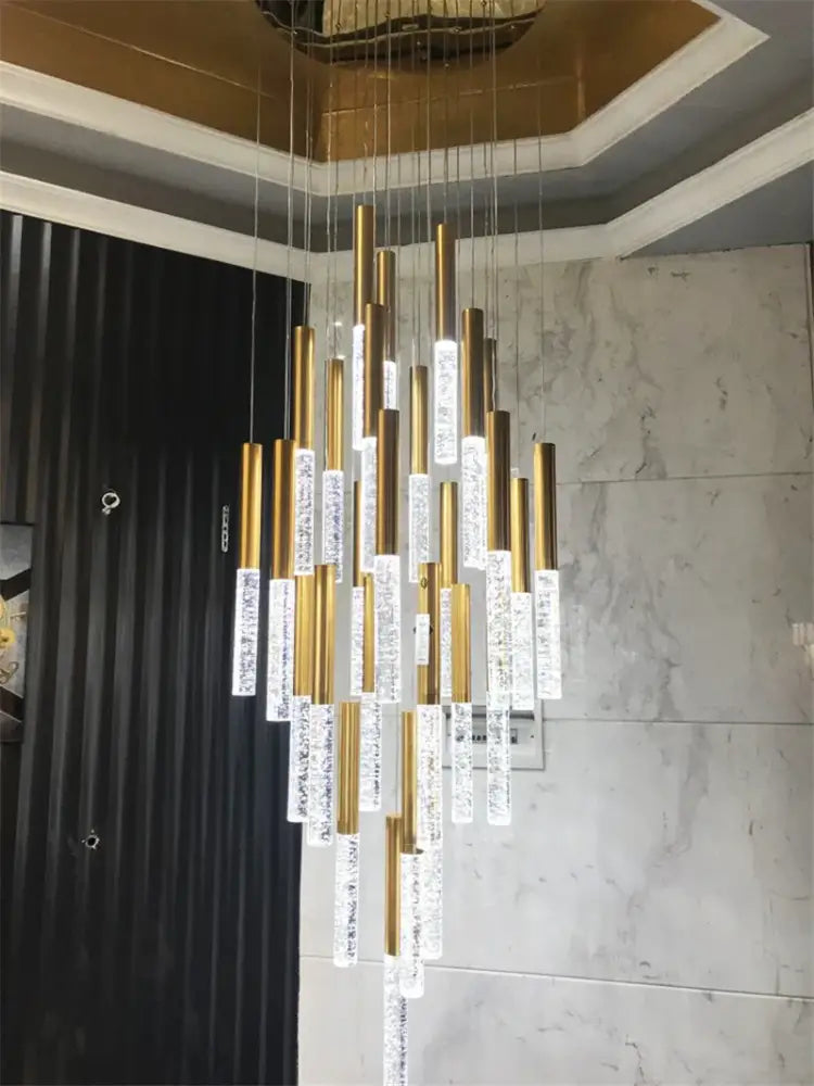 DecorBites™ contemporary crystal chandelier with gold metal rods and clear crystal cylinders for large staircase