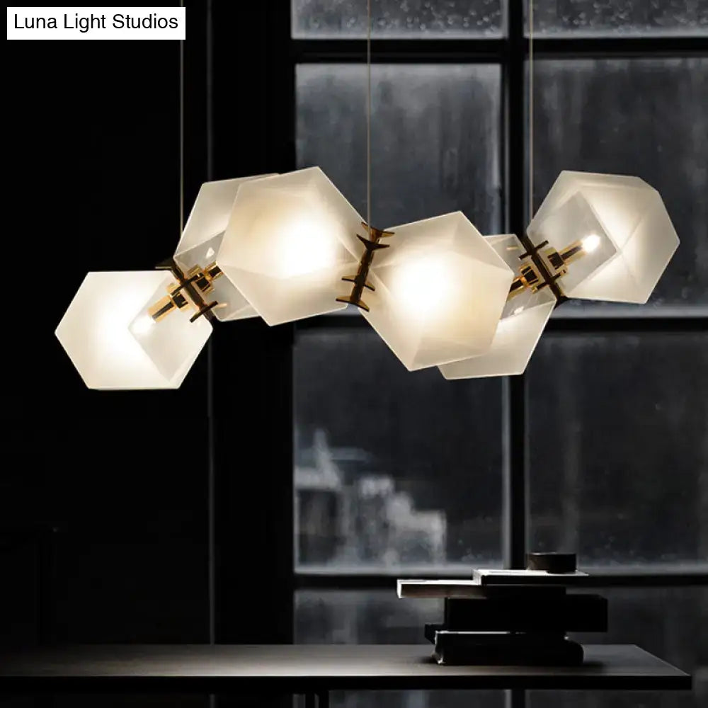 Modern geometric chandelier with frosted white glass honeycomb island lamp and brass ceiling hang for living room use