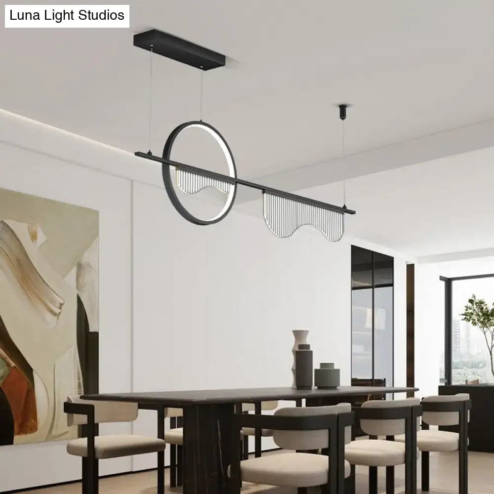 Modern black and white minimalist pendant light with circular frame and vertical slats for dining room by DecorBites™