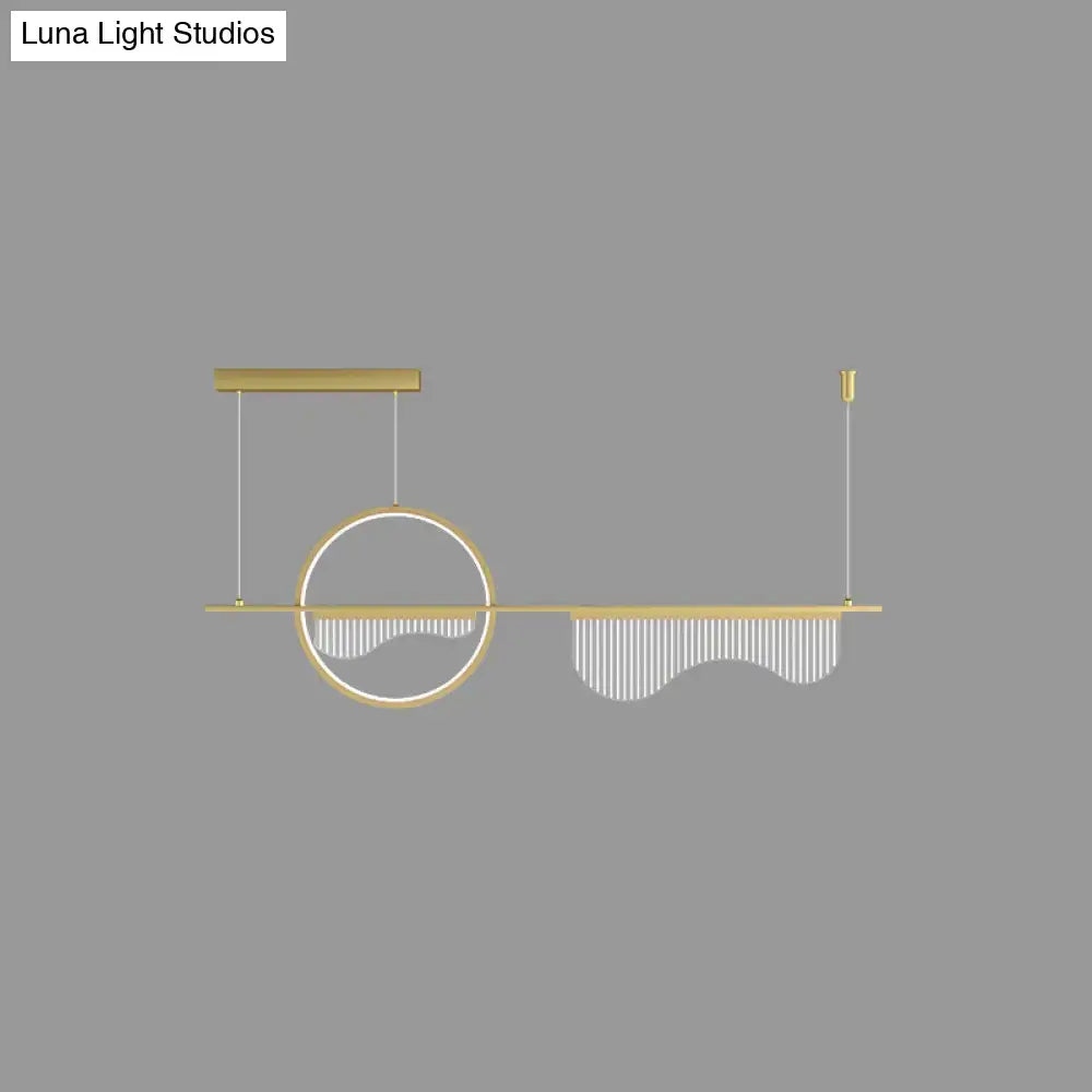 Modern gold-toned decorbites™ geometric led pendant light with circular frame and cascading glass rods for dining room island