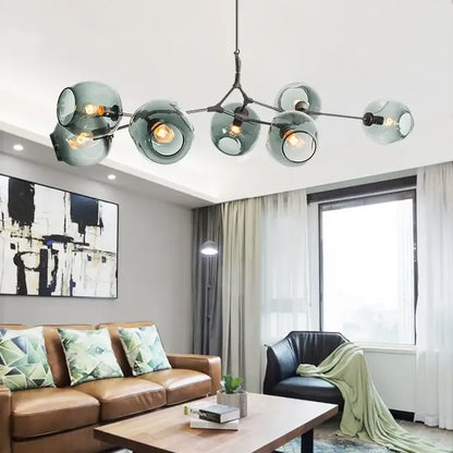 DecorBites™ contemporary glass bubble chandelier with teal glass globes and black metal arms for living room lighting