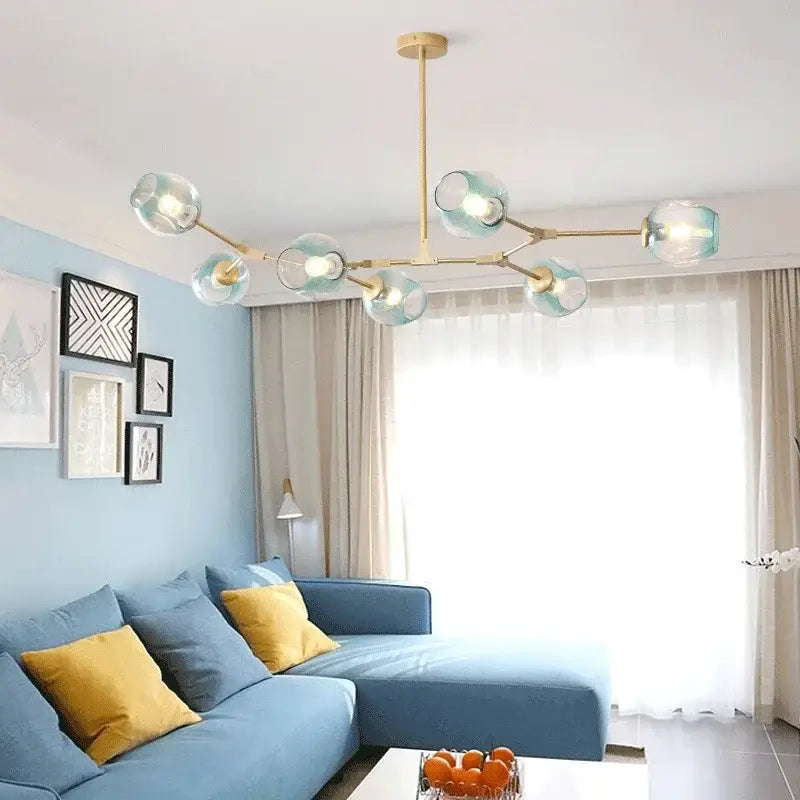 DecorBites™ contemporary glass bubble chandelier with gold-toned metal arms and teal glass bubble shades for living room