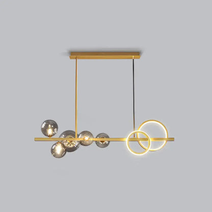DecorBites contemporary 7-head island lamp with gold-toned bar, milk white glass spheres, and smoke grey glowing rings