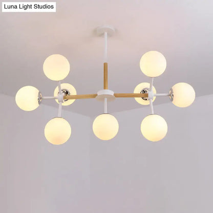 Decorbites contemporary globe chandelier with white glass spheres and wood metal frame for dining room hanging light