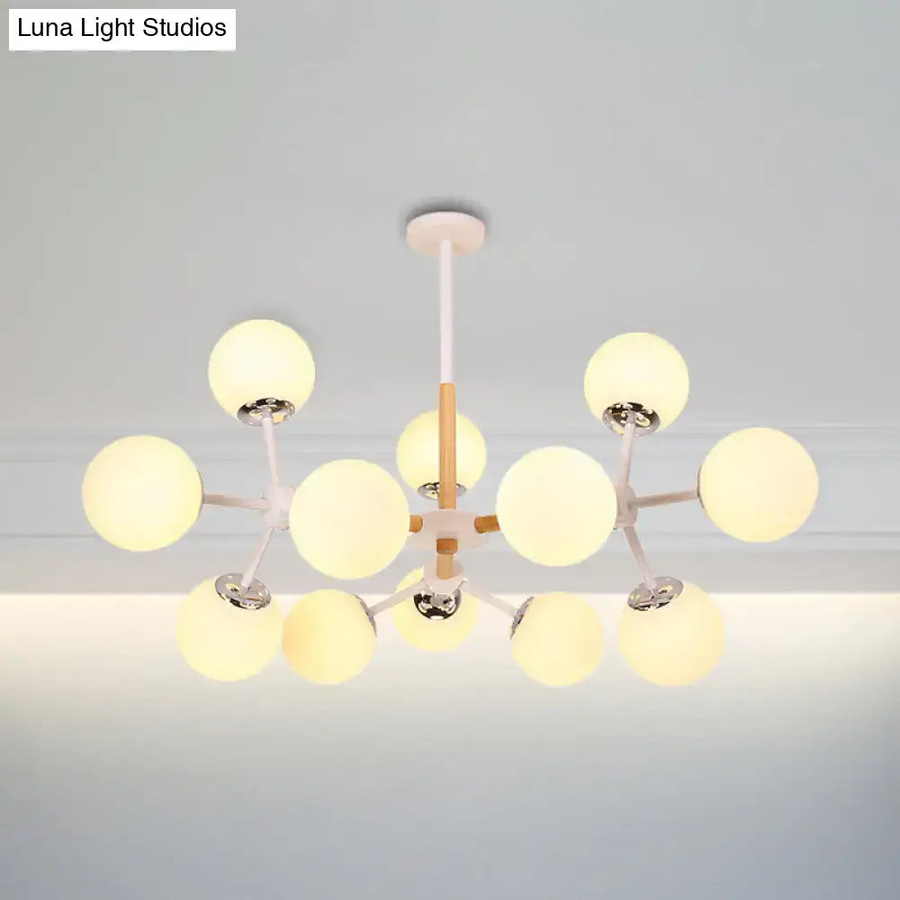 Modern DecorBites™ contemporary globe chandelier with white glass globes and wood-toned metal arms for dining room hanging light