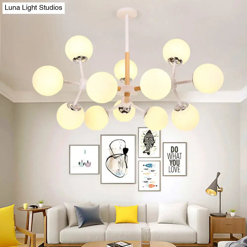 Decorbites contemporary globe chandelier with white glass globes and wood tones for dining room hanging light use