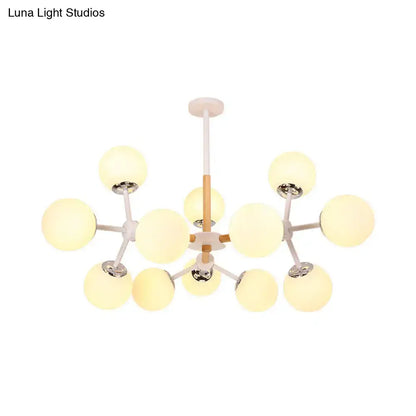 DecorBites contemporary chandelier with white glass globe bulbs and wood-toned arms for dining room hanging light