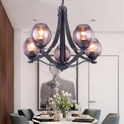 Black metal suspension pendant chandelier with five smoked globe gray glass shades for contemporary decor
