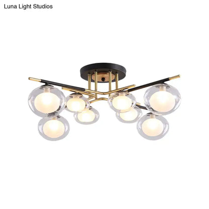 Decorbites contemporary semi-flush mount ceiling light with gold metal arms and clear oval shade glass globes