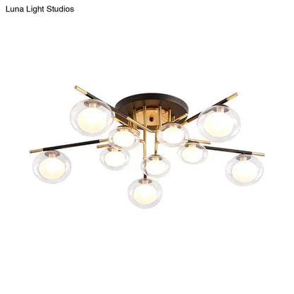DecorBites™ contemporary semi-flush mount ceiling fixture with brass base black and gold arms and clear oval shade globes