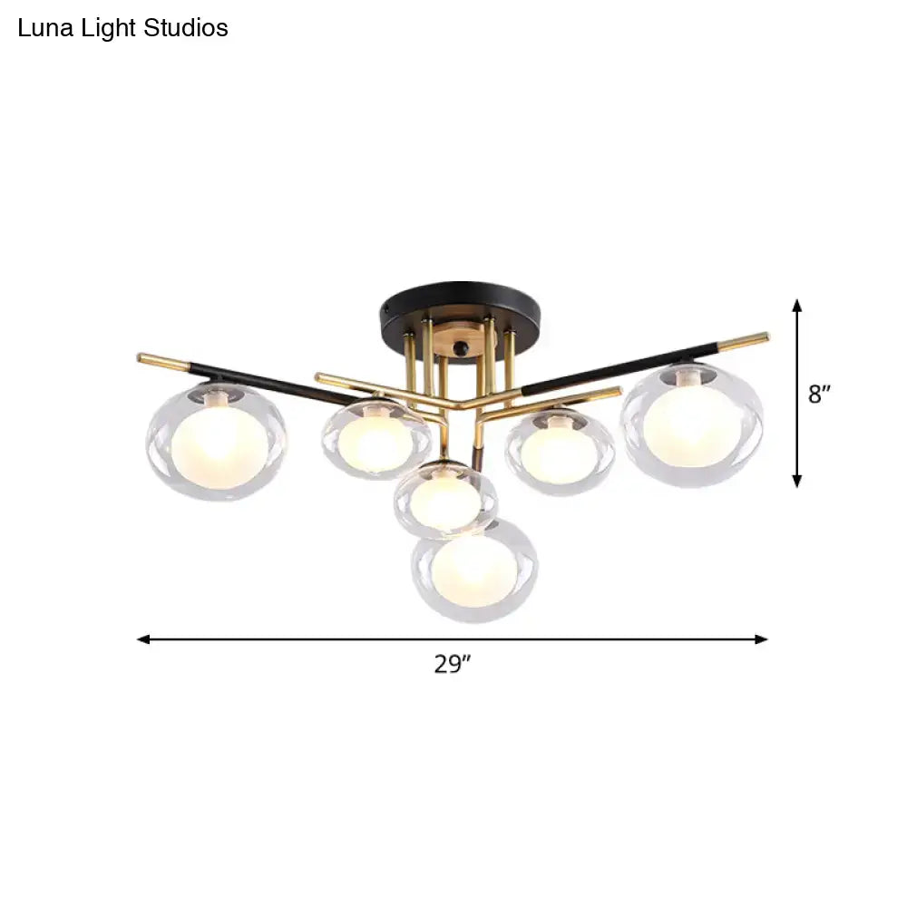 Modern semi-flush mount ceiling light fixture with oval shade glass globes and brass black metal arms for dining room