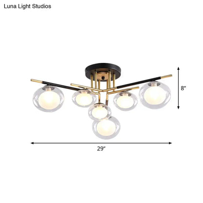 Modern semi-flush mount ceiling light fixture with oval shade glass globes and brass black metal arms for dining room