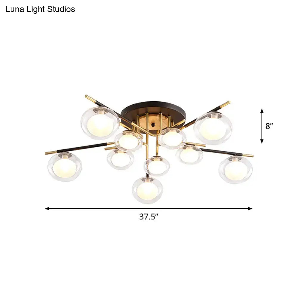 DecorBites™ contemporary semi-flush mount ceiling light with brass base, black gold arms, and clear glass oval shade bulbs
