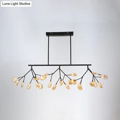 Black metal DecorBites heracleum island pendant with branching arms and amber glass teardrop island pendant light