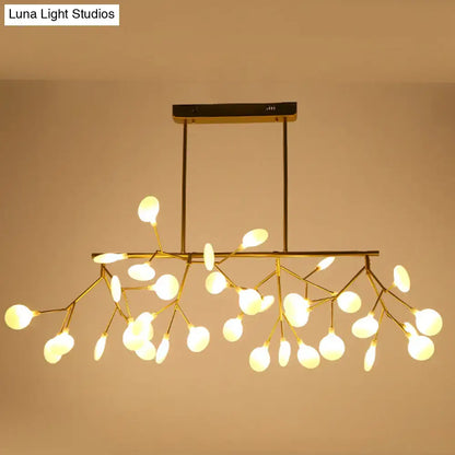 Gold-toned DecorBites™ contemporary heracleum island pendant light with branching arms and frosted glass globes for dining rooms