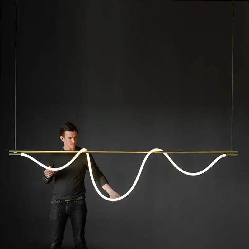 A decorbites™ contemporary led chandelier with gold metal frame and long hose led tubing for dining room lighting