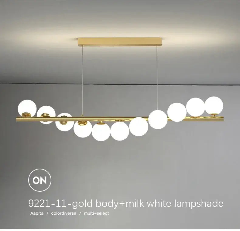Gold-toned DecorBites™ contemporary LED glass ceiling chandelier with sleek horizontal bar and milk white spherical lampshades