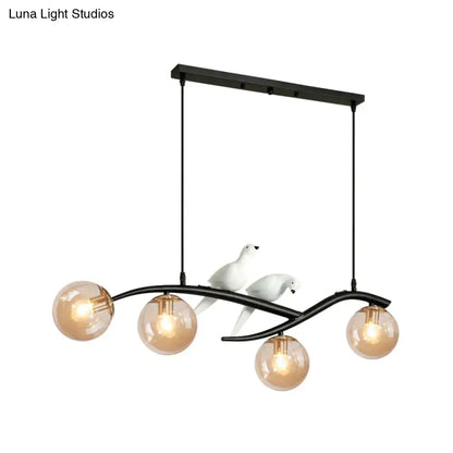DecorBites contemporary black metal branch hanging lamp with four amber globes and white ceramic doves smoke grey cognac