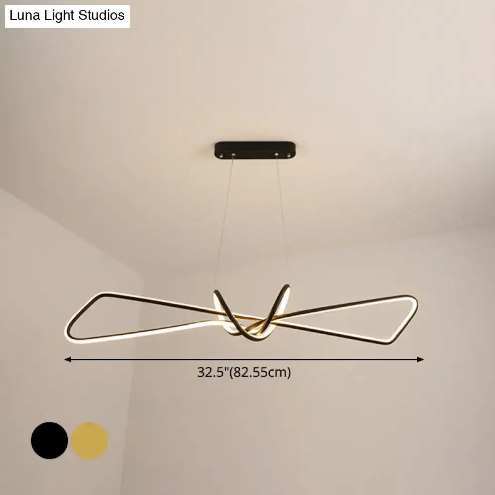 Modern gold-toned led chandelier with sleek intertwined geometric design and black mounting plate for contemporary metal dining use in bowtie led island lighting