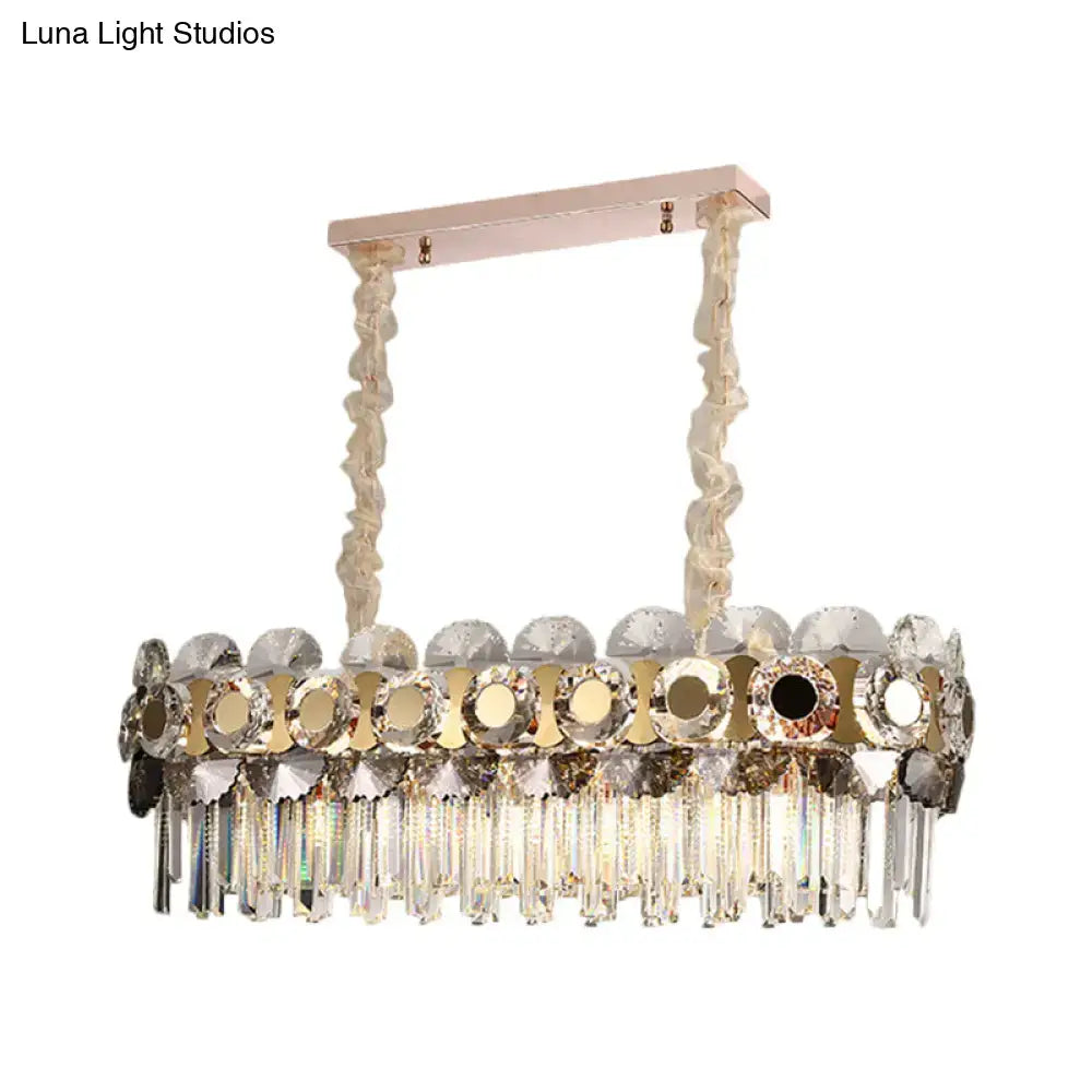 Elegant rose gold decorbites metal facing island chandelier with rectangular frame, crystal prisms, and twisted suspension chains