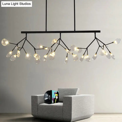 Black metal pendant chandelier with branching arms and clear glass shade bulbs featuring a round canopy