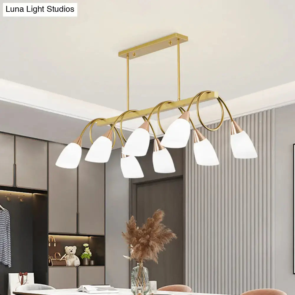Gold-toned DecorBites™ contemporary milk glass tulip shade island pendant light with eight frosted glass shades and curved arms