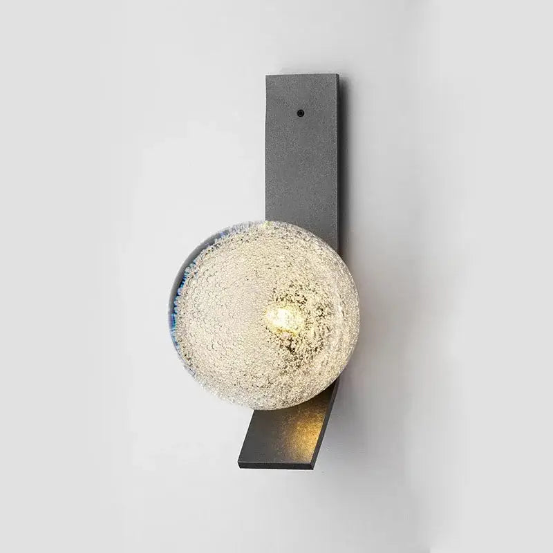 DecorBites™ contemporary wall light with textured frosted glass globe in blue and white hues on matte black metal
