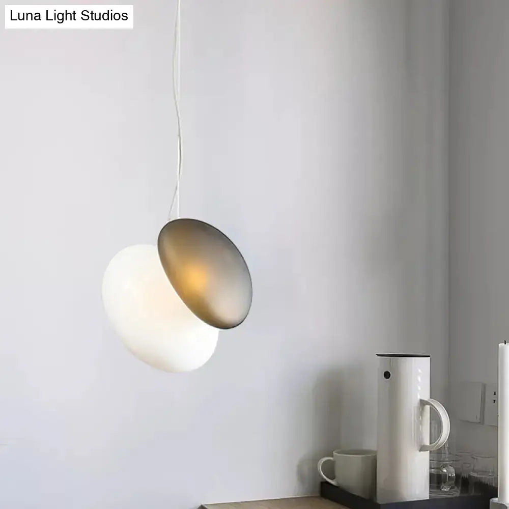 DecorBites™ contemporary white glass pendant light with matte white globe and brushed gold disc for dining room ceiling