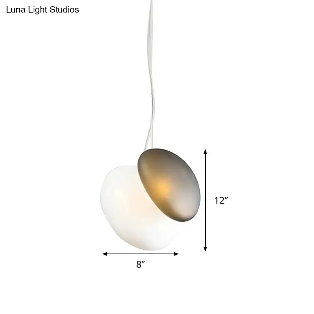 Decorbites contemporary white glass pendant light with overlapping frosted white and brushed gold shades for dining room